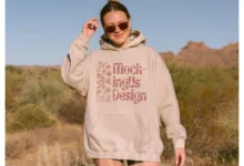 Person wearing oversized hoodie outdoors.