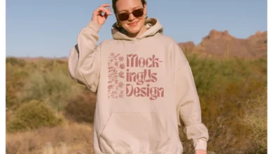 Person wearing oversized hoodie outdoors.
